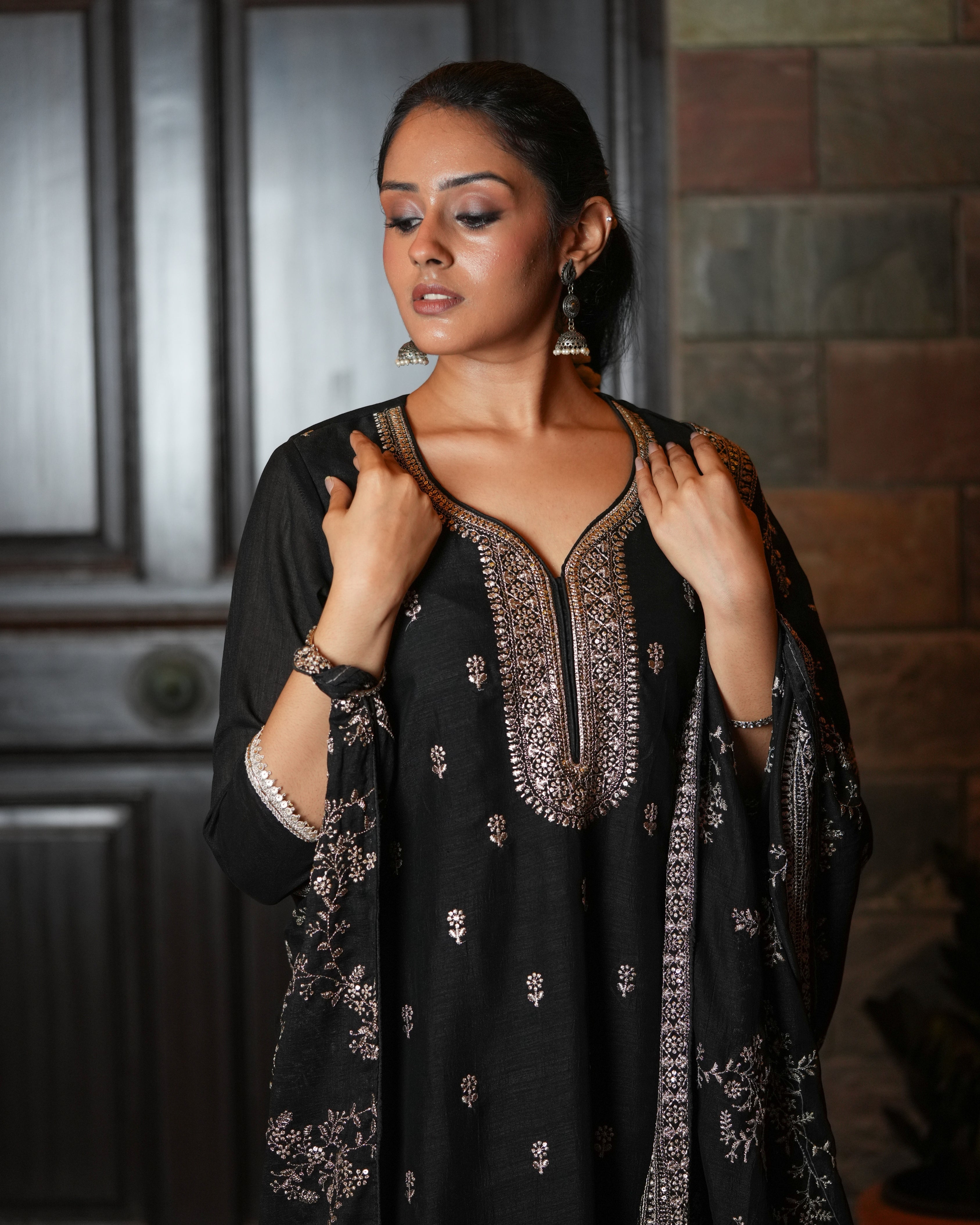Step into classic sophistication with this timeless black ethnic set
