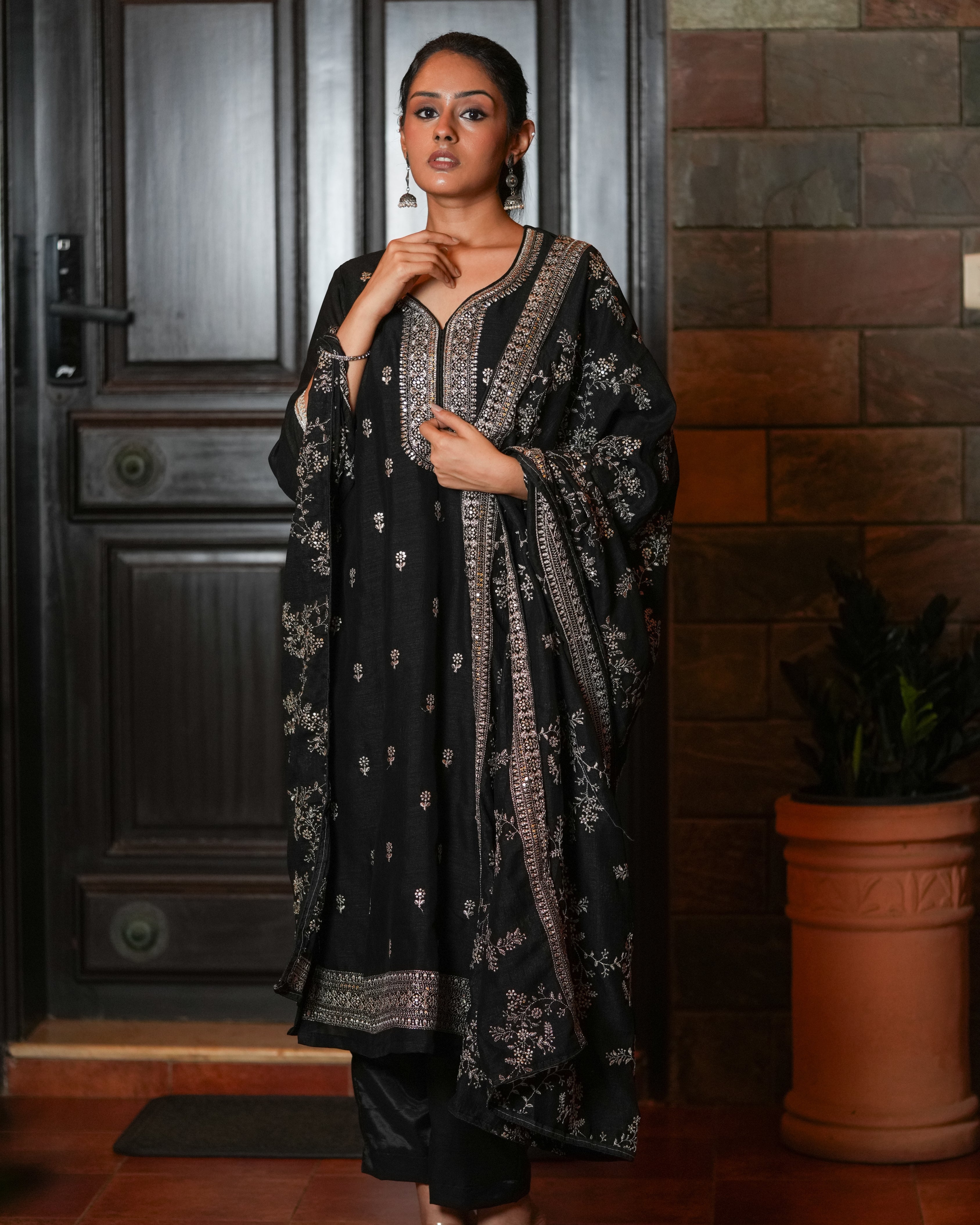 Step into classic sophistication with this timeless black ethnic set