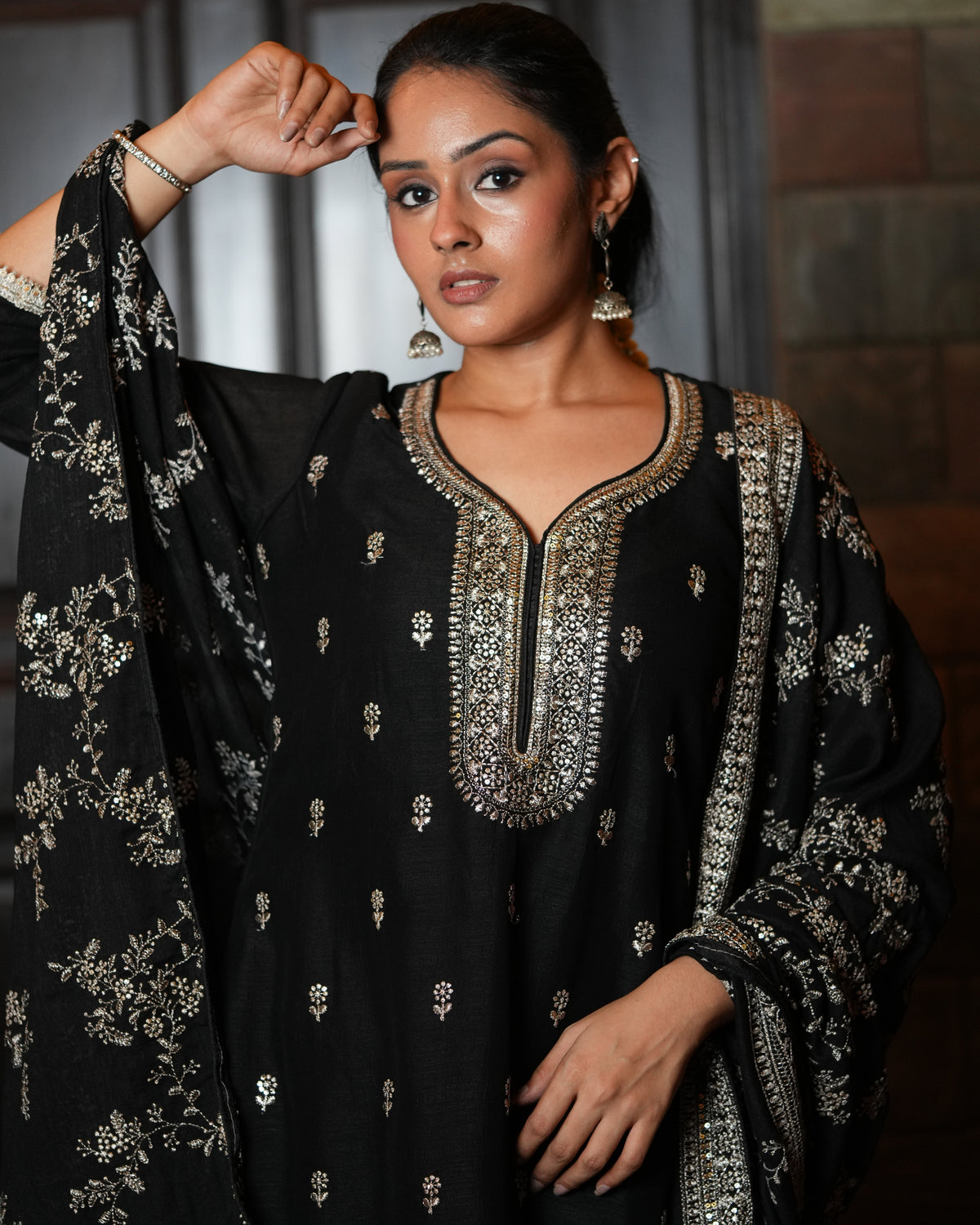 Step into classic sophistication with this timeless black ethnic set