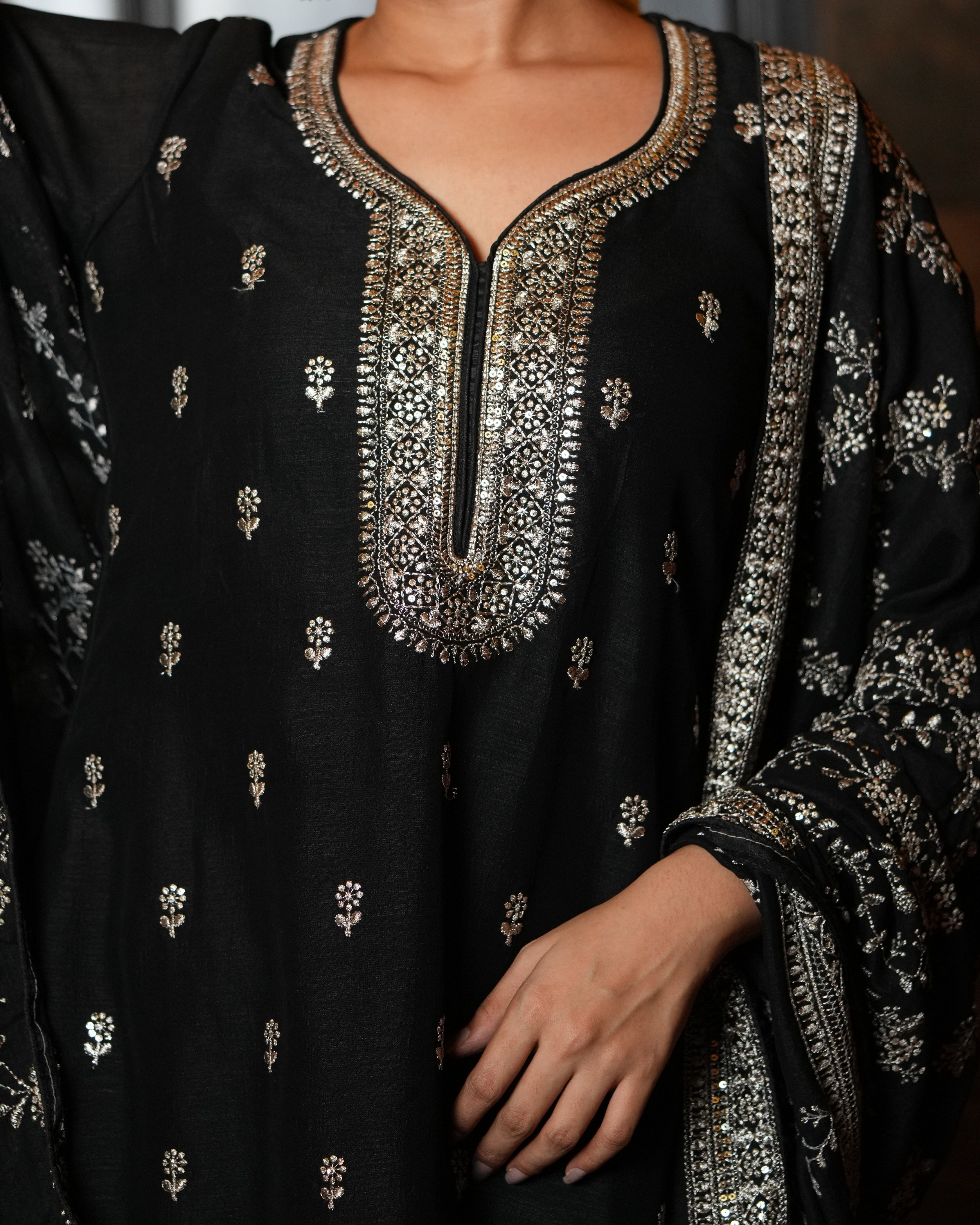 Step into classic sophistication with this timeless black ethnic set