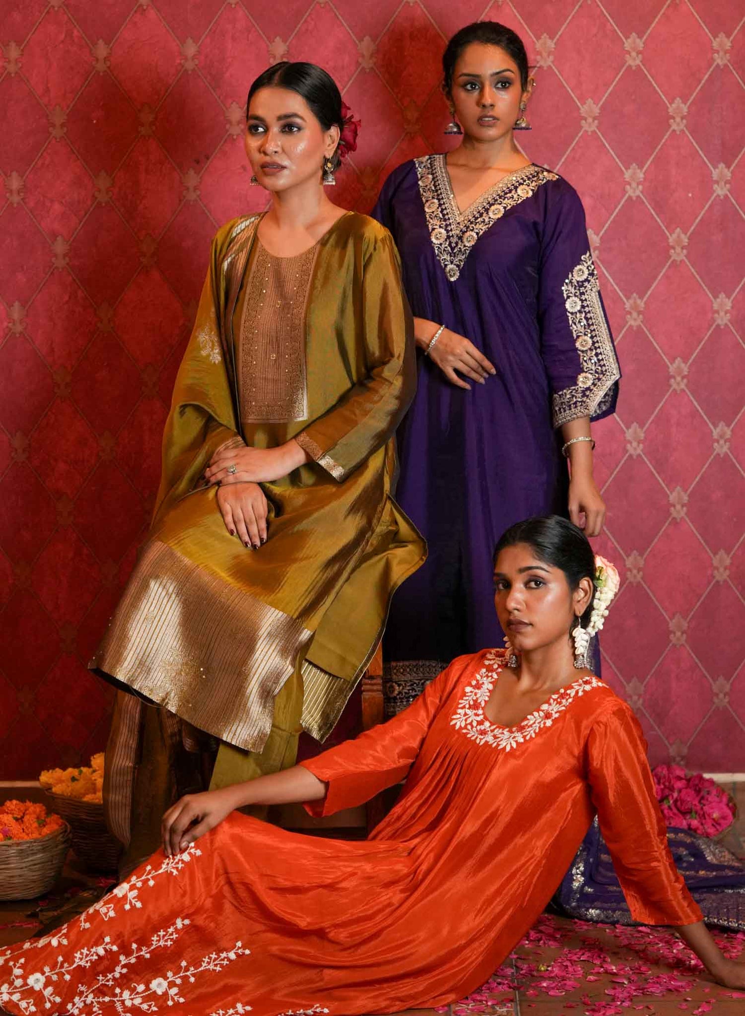 Radiate vibrant elegance with this striking orange ethnic set